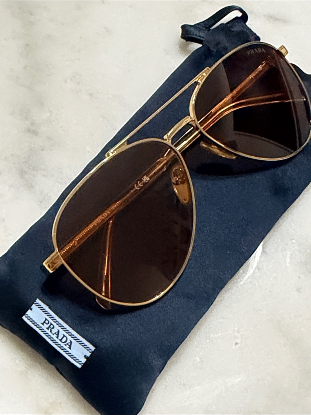 Prada Amber/Brown Lens Aviator Sunglasses